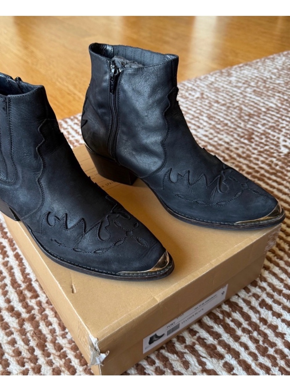 To Be Announced (TBA) Pony Black Leather Booties, size 9